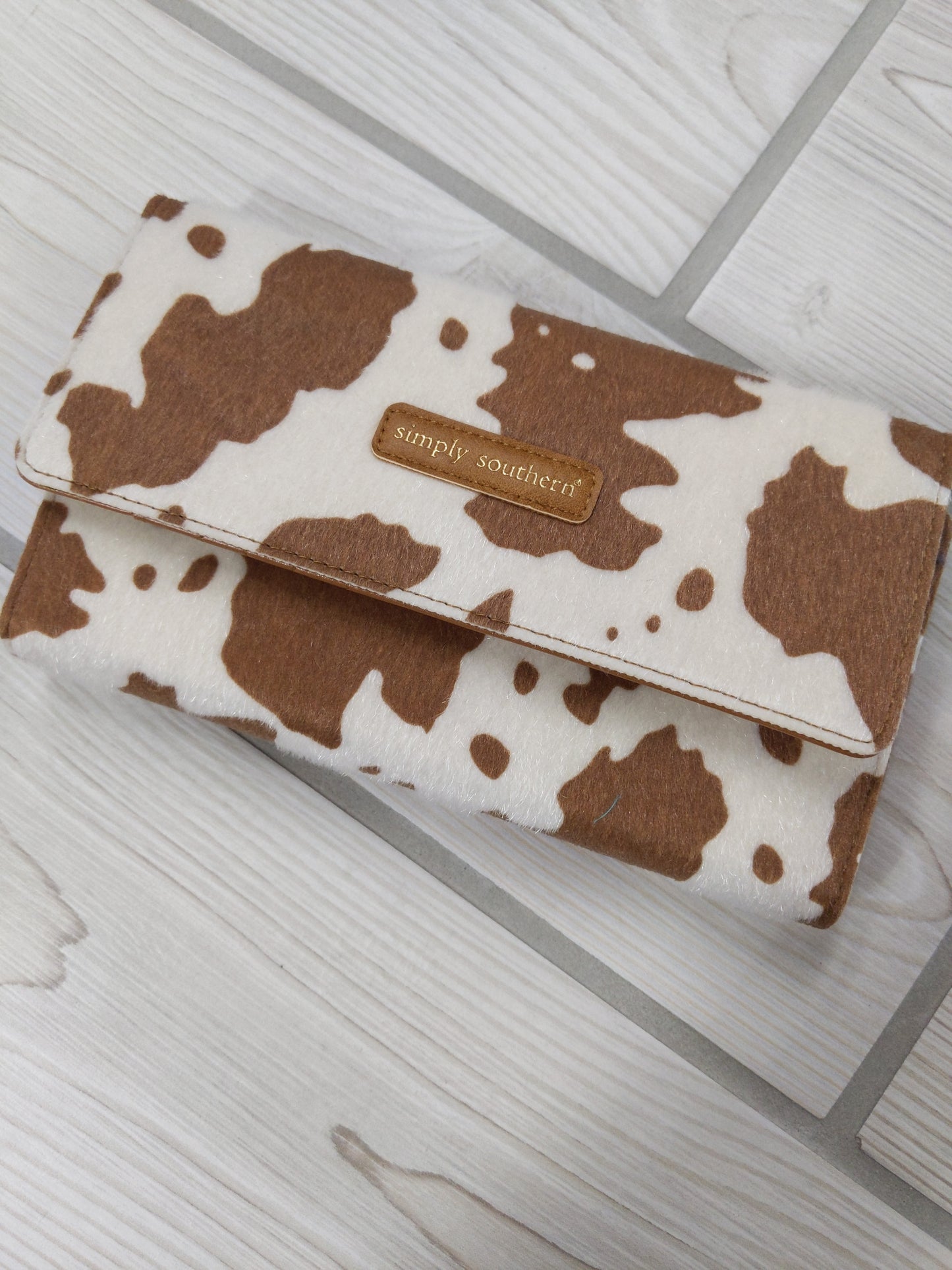 0322-LTHR-PHONECLUTCH-COW